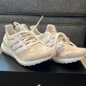 Brand new, never worn Adidas running sneakers.
